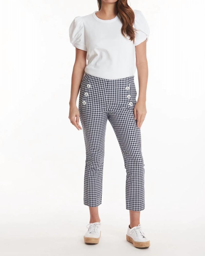 Front of a model wearing a size 10 Gigi Gingham Kick Flare Pant In Navy/White in Navy/White by Tyler Boe. | dia_product_style_image_id:354475